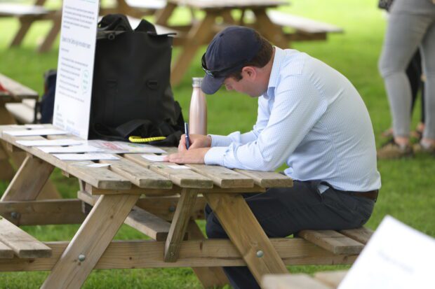 Defra Future Farming - man writing at table