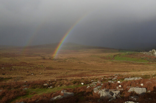 Sun and showers over Vixen Tor, Dartmoor, Devon, UK.