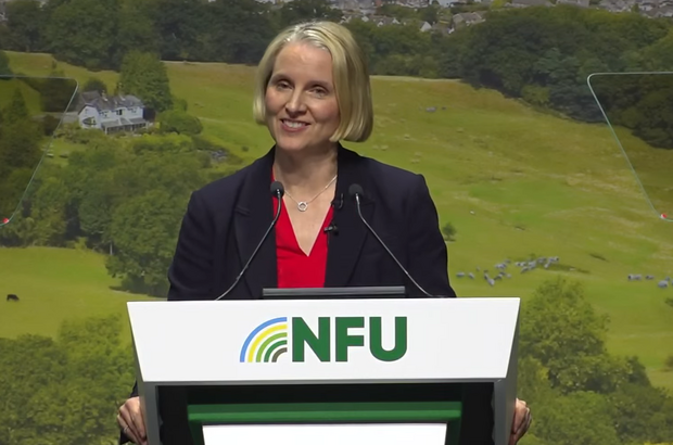 Secretary of State Emma Reynolds standing at the lectern NFU26